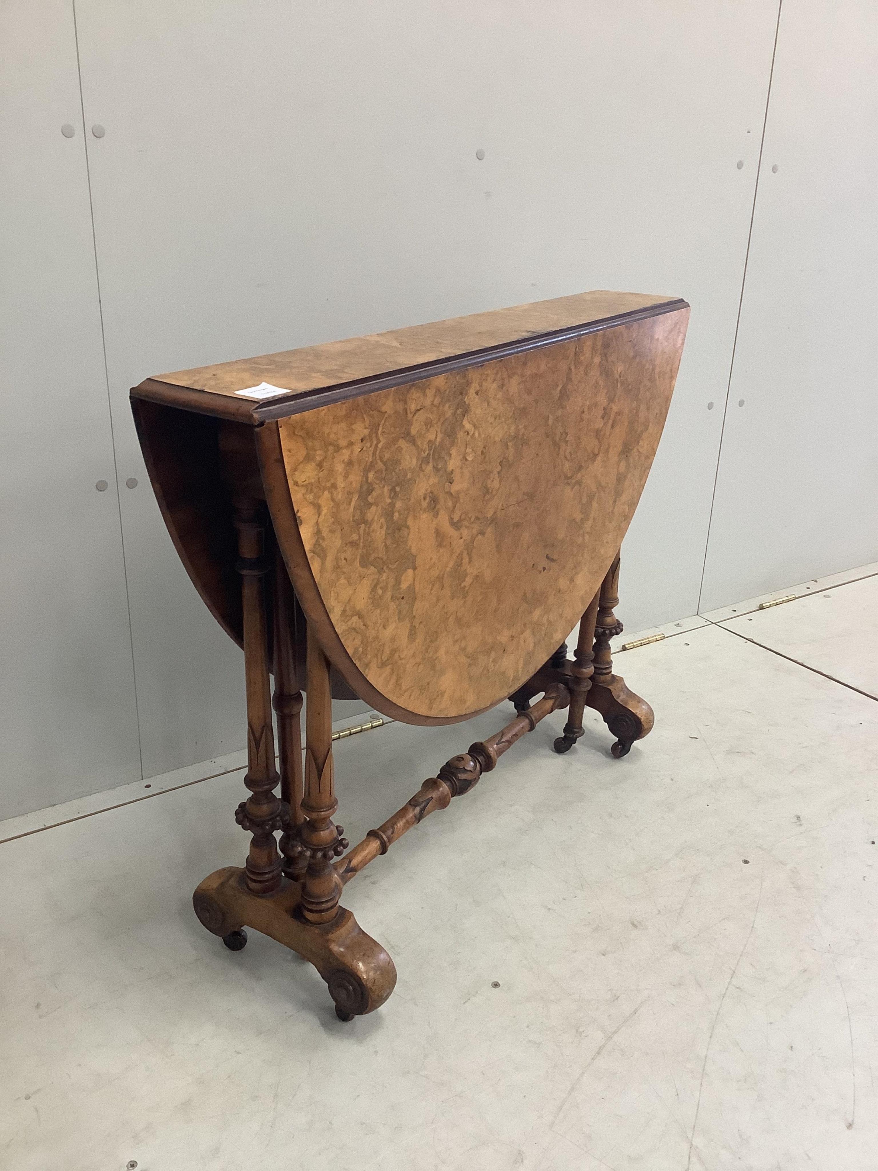 A Victorian burr walnut Sutherland table, width 90cm, height 71cm. Condition - fair